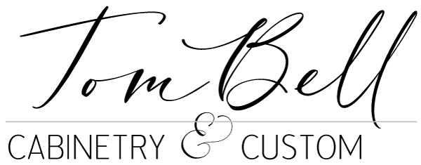 tom bell logo